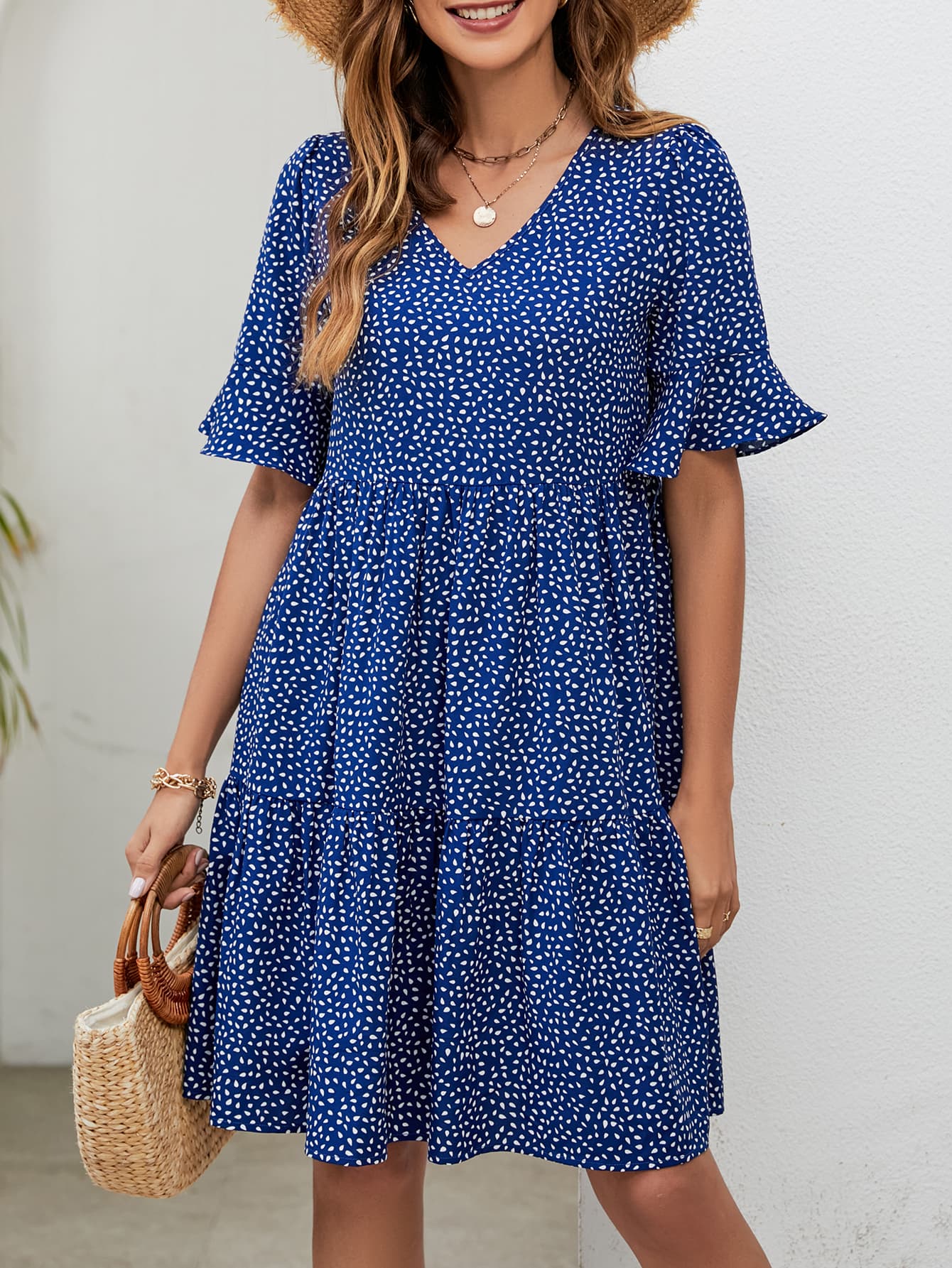 Robe imprimée à col en V et longueur genou
