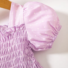 Robe smockée imprimée à col carré