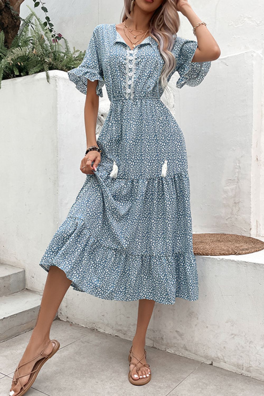 Robe imprimée à volants et pompons
