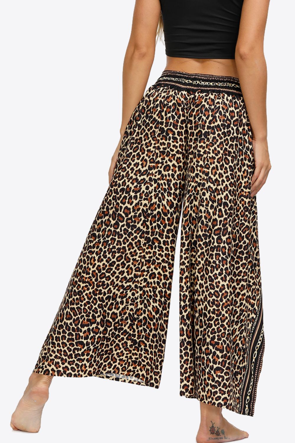 Pantalon long à jambes larges fendues
