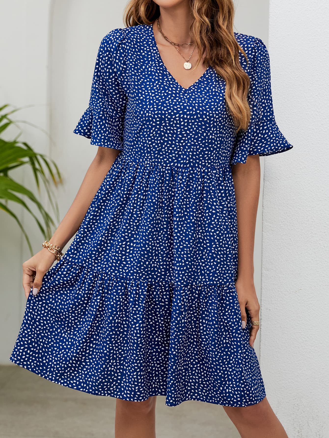 Robe imprimée à col en V et longueur genou