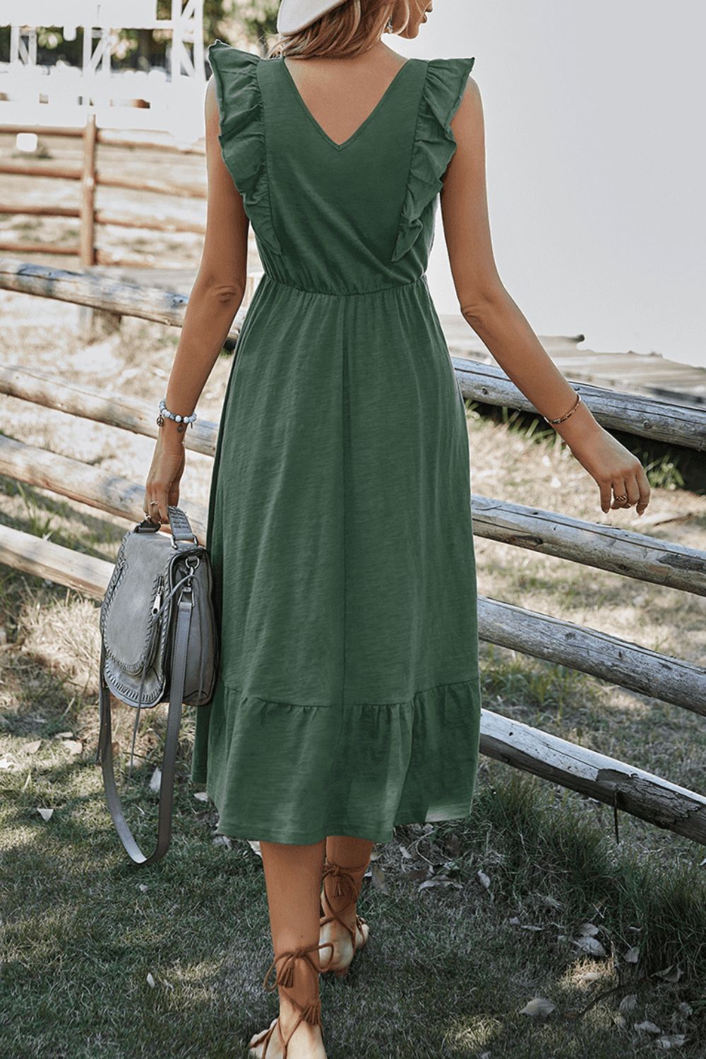 Robe mi-longue à col rond et ourlet à volants
