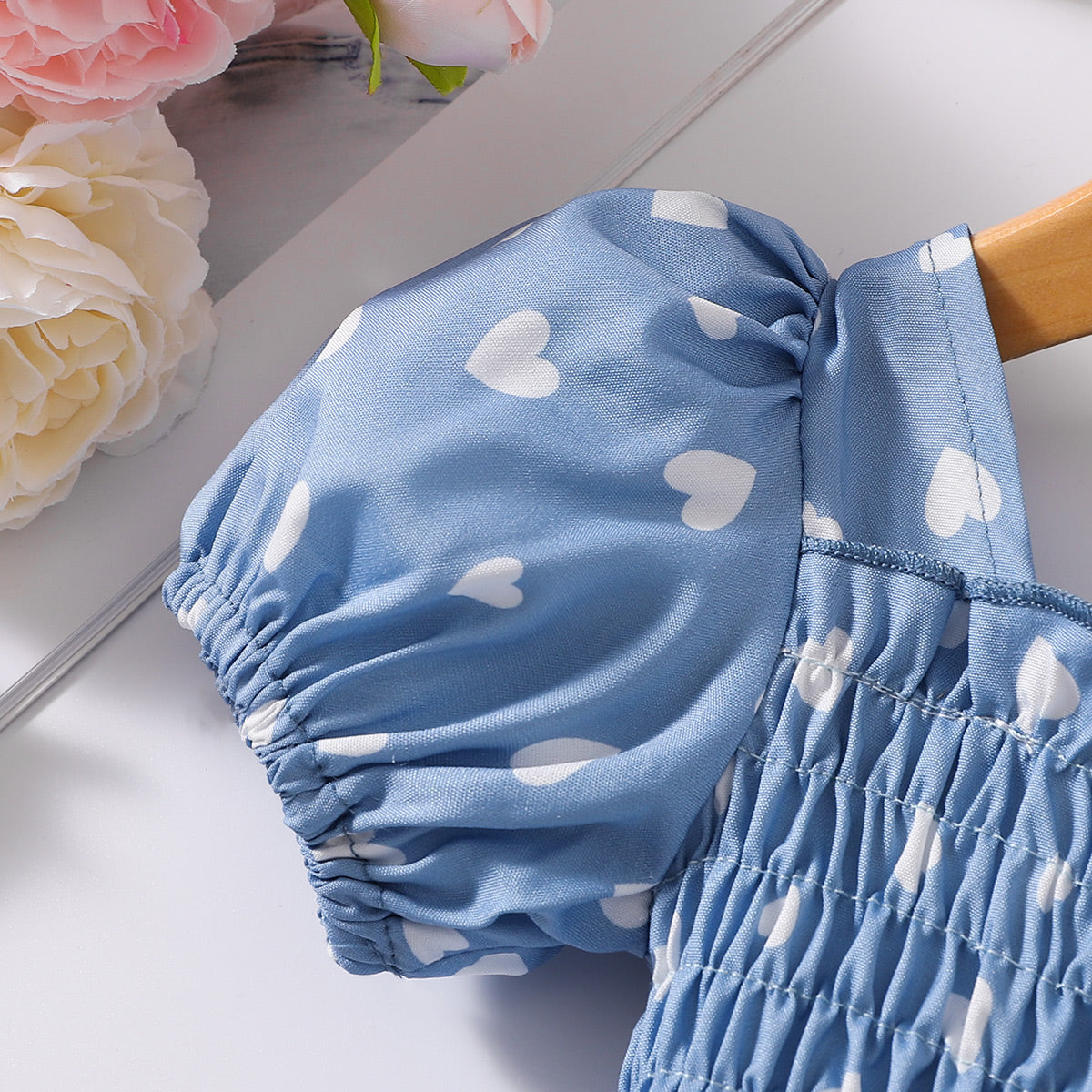 Robe smockée imprimée à col carré