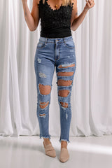 Jean skinny à ourlet brut effet usé