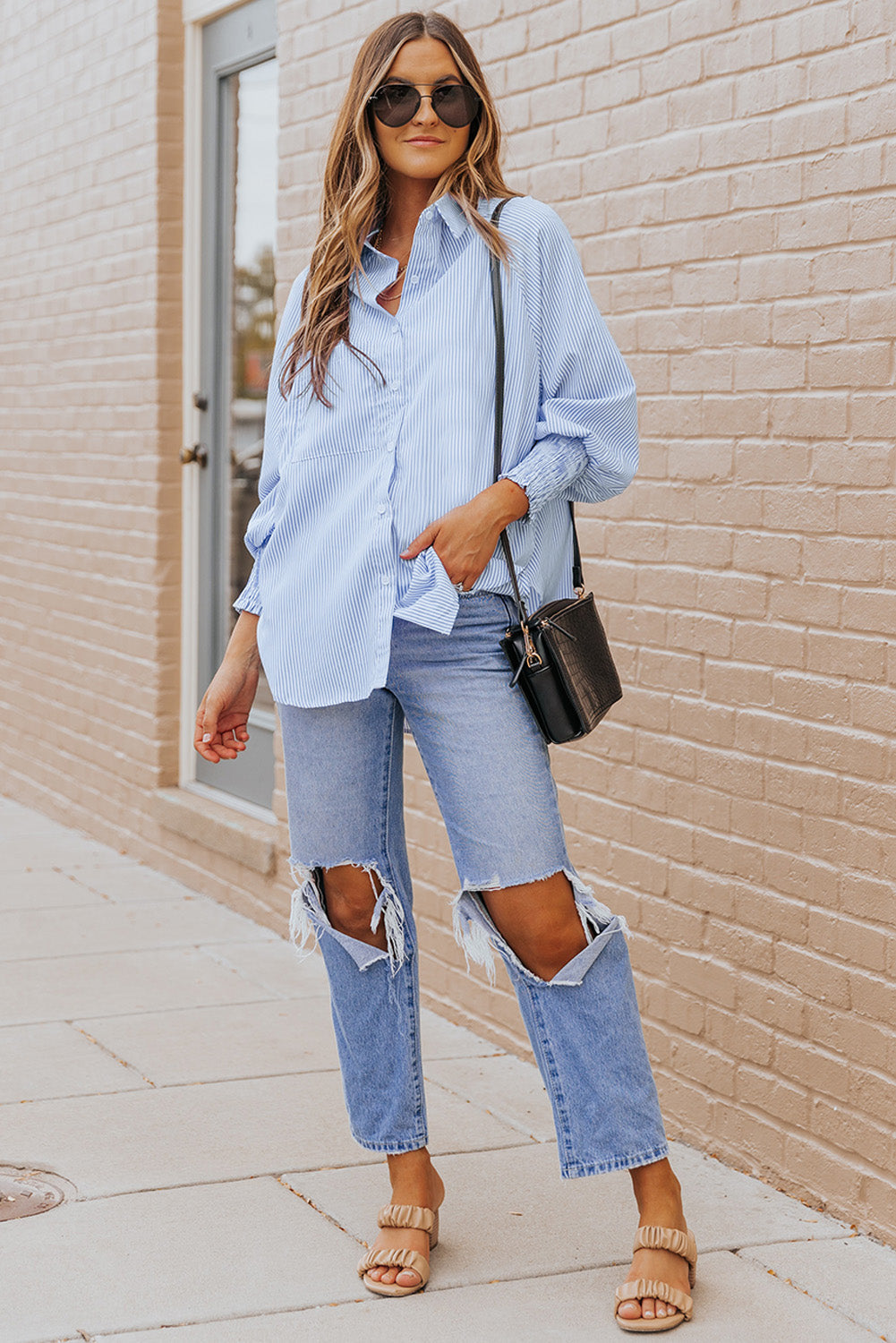 Chemise rayée à smocks et boutons sur le devant