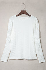 Haut en tricot texturé à manches bouffantes