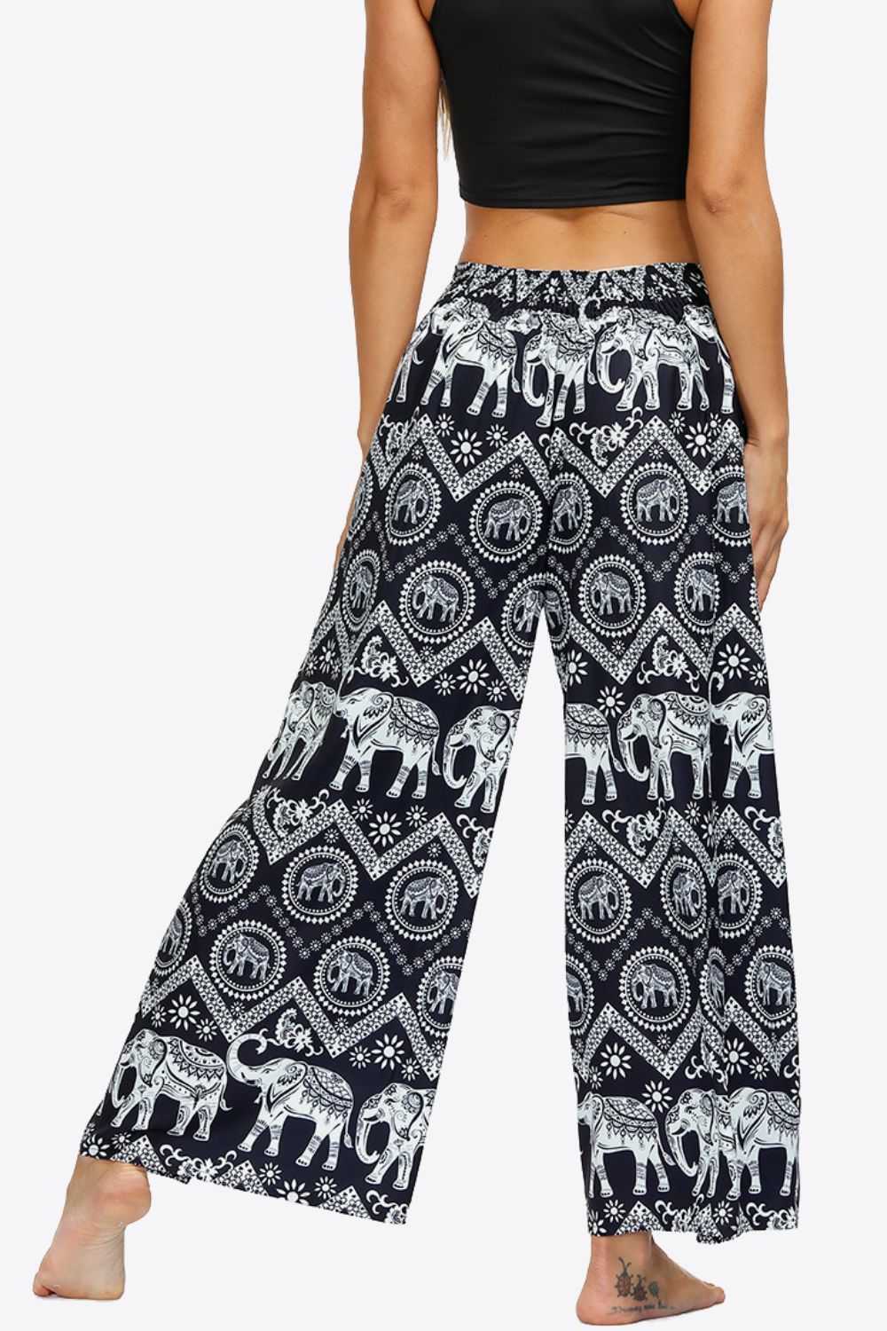Pantalon long à jambes larges fendues