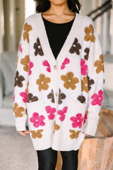 Weißer langer Cardigan mit Blumenmuster und Taschenknöpfen