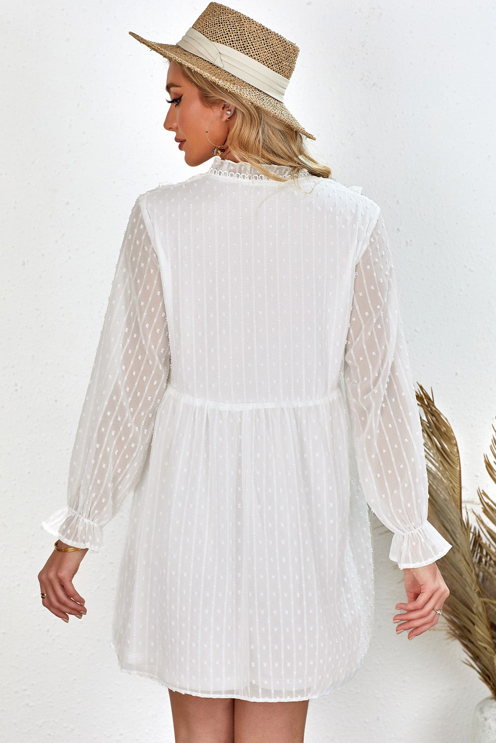 Mini-robe à volants et manches longues à pois suisses