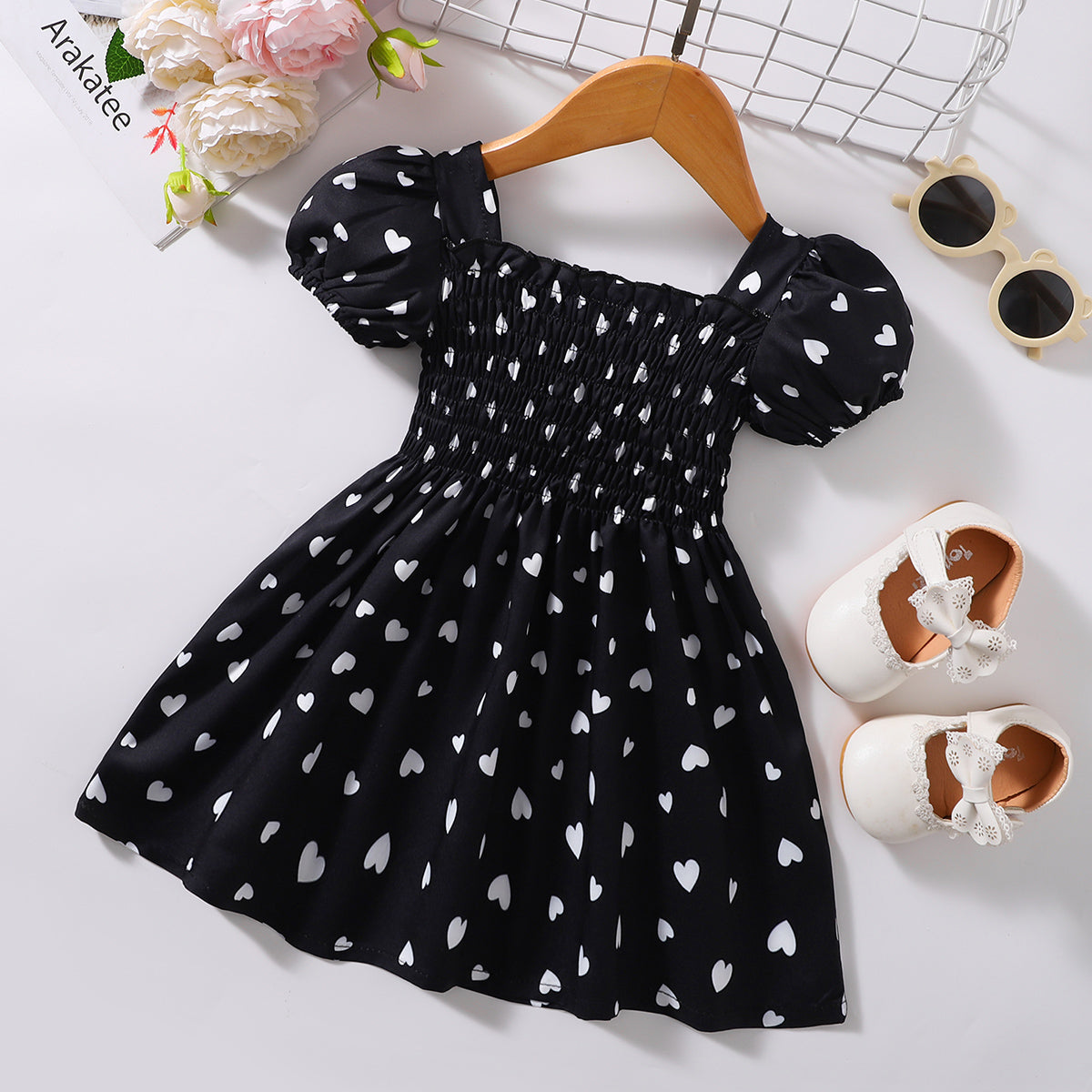 Robe smockée imprimée à col carré