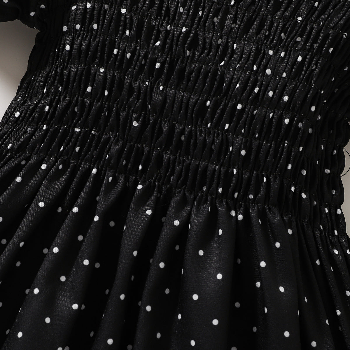Robe smockée imprimée à col carré