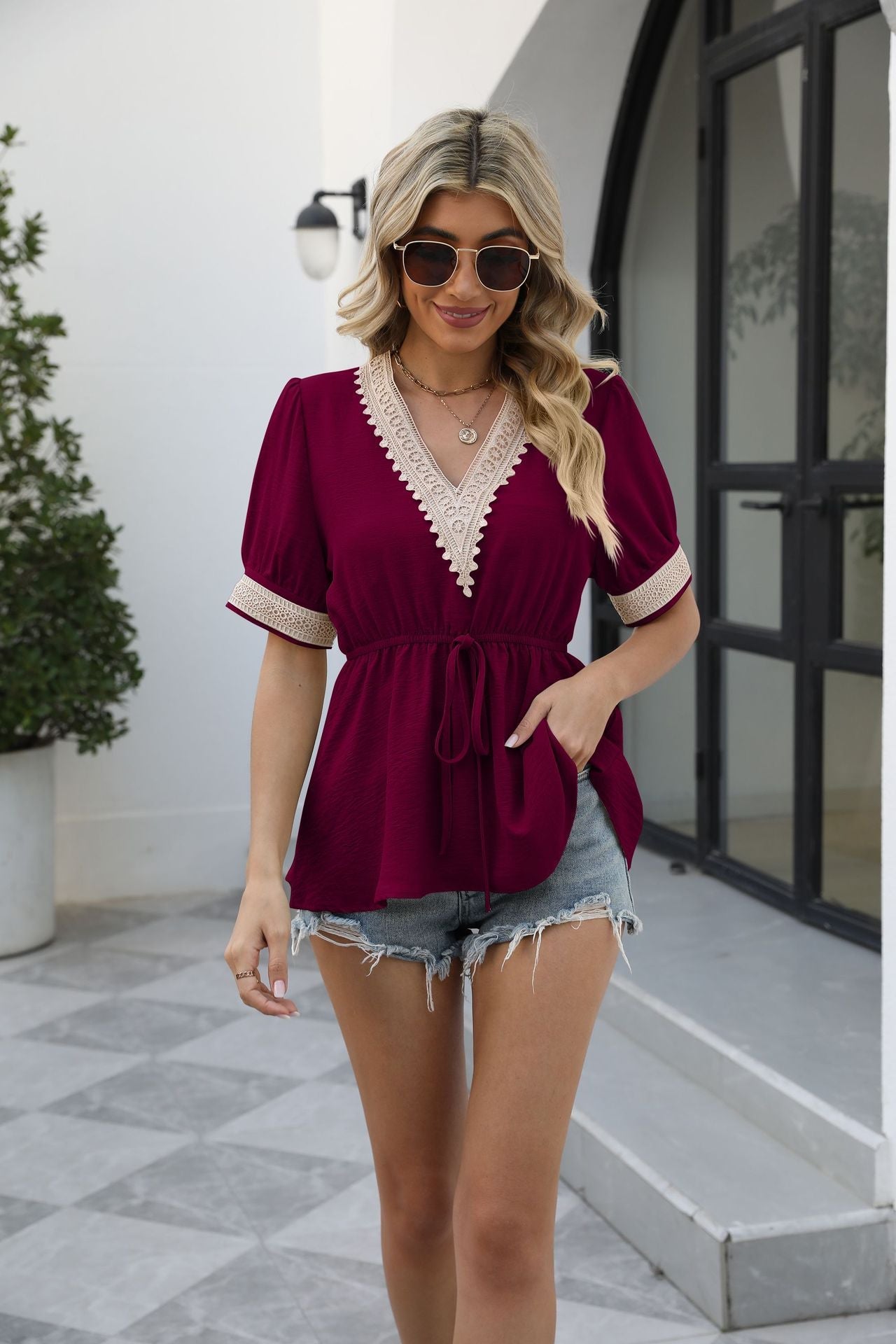 Haut babydoll à manches bouffantes et col en V