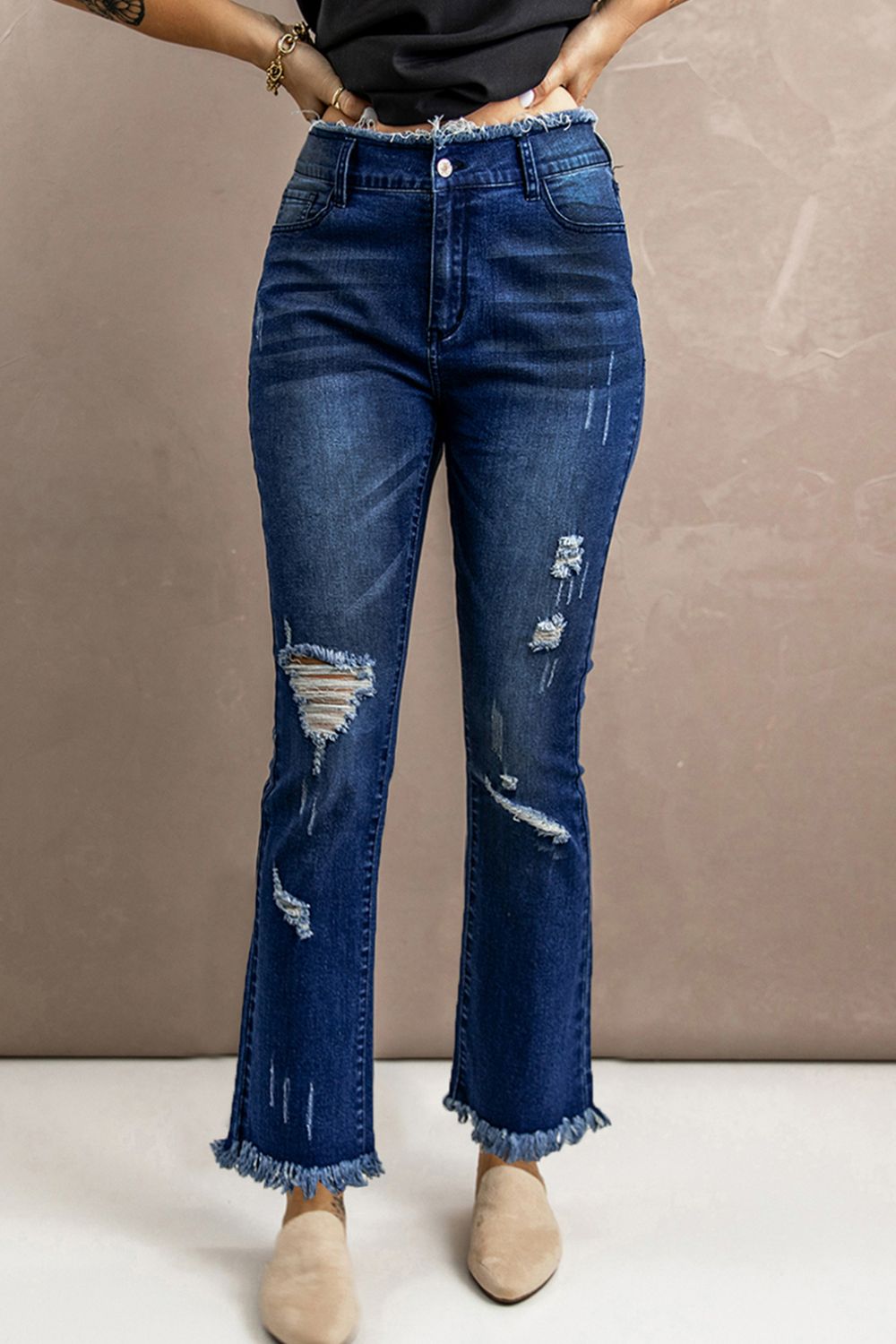 Jean taille haute à ourlet brut effet usé