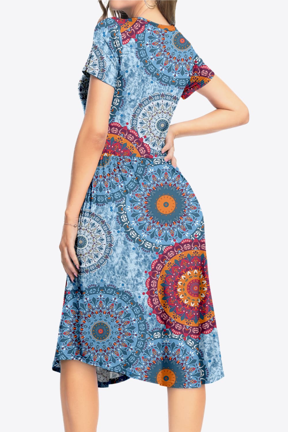 Robe imprimée à col rond et manches courtes avec poches