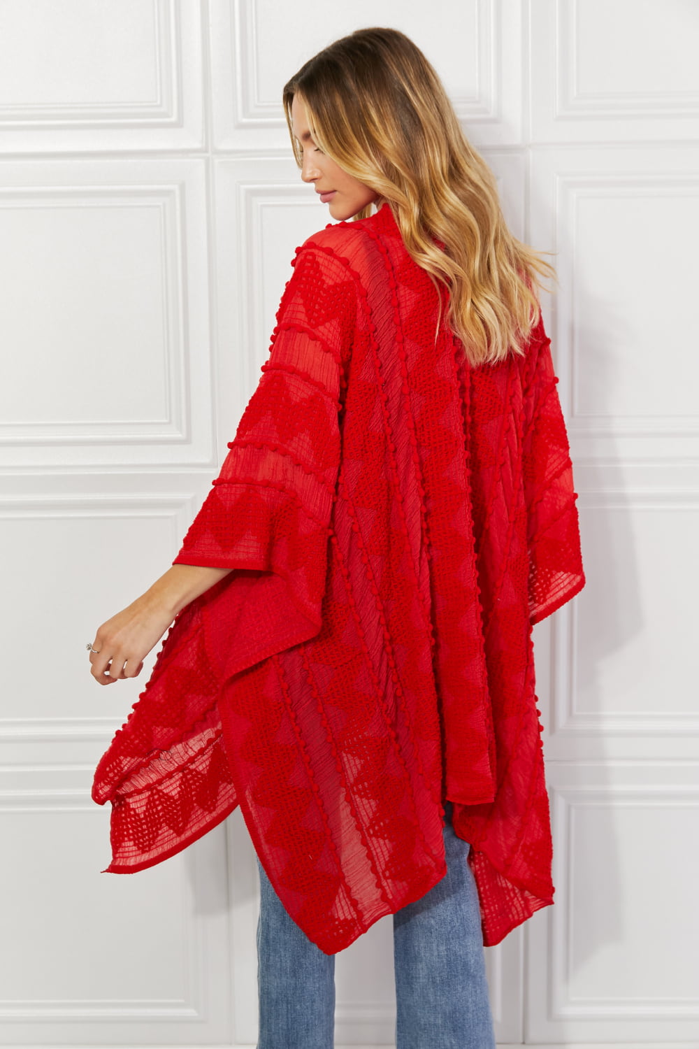 Justin Taylor – Asymmetrischer Poncho-Cardigan mit Pom-Poms in Rot